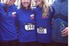 Participating in a local 5k run for charity 